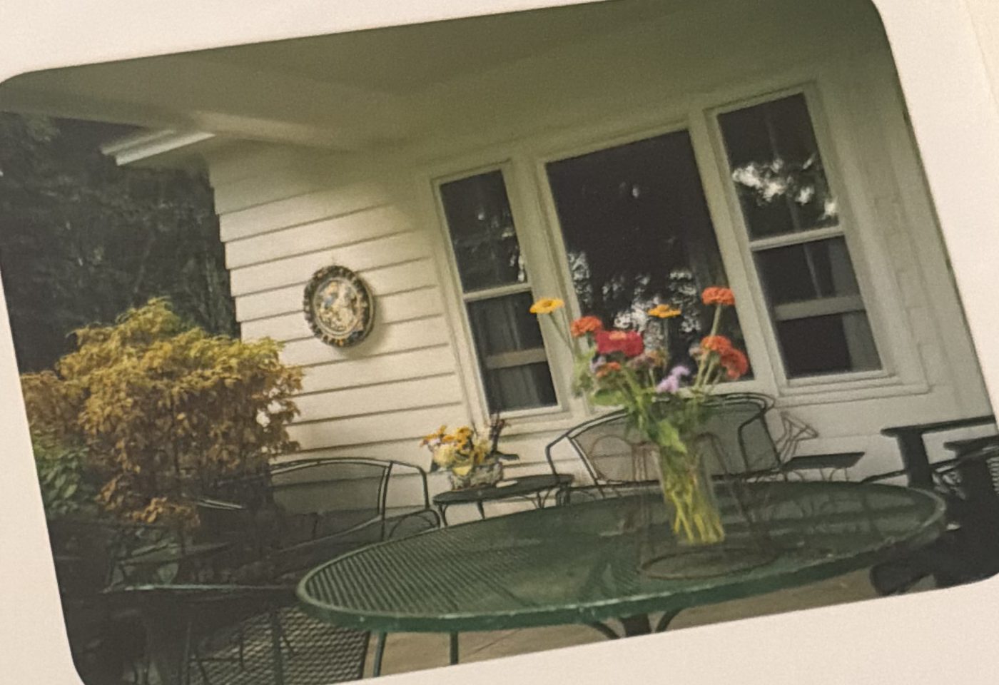 Flowers on the porch at Knollwood years ago